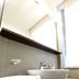 Residence Diamanterosso in Terni bathroom with vessel sink, stacked towels, and bright window light