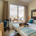 Hotel Aubi in Palamós guest room with twin beds and sliding glass door to a balcony