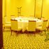 Lvjing International Hotel Taizhou dining room with round table, upholstered chairs and patterned carpet