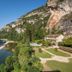 Château de la Caze in Gorges-du-Tarn-Causses beside a river and cliffs with a pool and garden