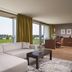 Van Der Valk Hotel Ara in Zwijndrecht living area with balcony and river view
