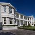 Banksia Boutique Hotel & Spa in Cape Town, white colonial-style hotel with manicured gardens and mountain backdrop