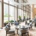 Courtyard by Marriott Hong Kong Sha Tin lobby lounge with floor-to-ceiling windows and seating