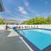 Best Western Black Hills Lodge pool in Spearfish with lounge chairs and clear blue sky