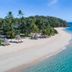 Paradise Cove Resort, Naukacuvu Island: white-sand beach, turquoise sea, palm trees and a boat offshore