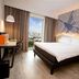 ibis Styles Lima Benavides Miraflores room with king bed, desk and city view in Lima
