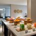 Lincolnshire Marriott Resort breakfast buffet with fruit, pastries and bar seating in Lincolnshire