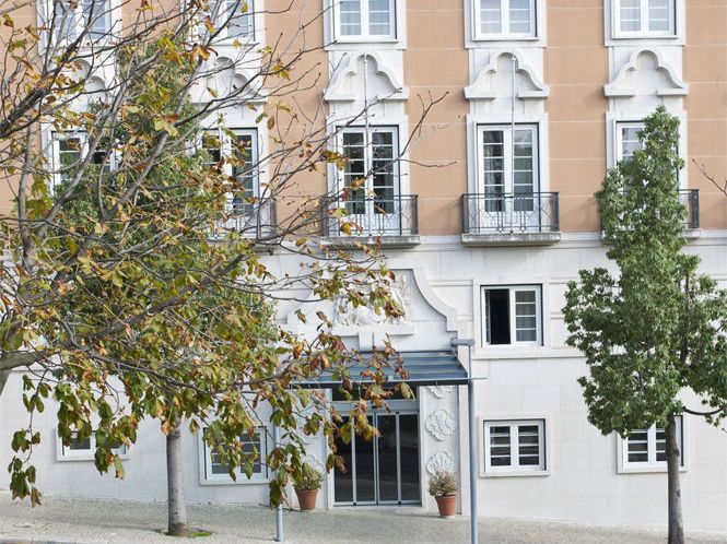 Miraparque in Lisbon exterior with ornate facade, balcony windows and a small entry canopy