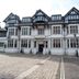 The Portland Hotel in Chesterfield, exterior view of a white Tudor-style hotel building