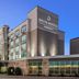 Delta Hotels by Marriott Midwest City at the Reed Conference Center exterior in Midwest City at dusk