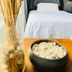 Hotel Grand Vista Cuernavaca room with single bed and decorative dried reeds in a glass vase