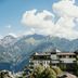 Schlosshotel Fiss in Fiss with alpine mountain views and a grassy hillside setting