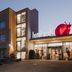 Hotel Süd Graz in Graz exterior at dusk with illuminated entrance and modern facade