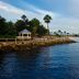506 Little Harbor Inn in Ruskin with a waterfront dock, gazebo, palm trees, and calm bay views