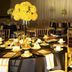 506 Little Harbor Inn in Ruskin: banquet tables set with gold chairs and yellow floral centerpieces