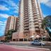 Fiori Apartments in Sydney high-rise towers with balconies under a blue sky