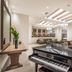 Nana Golden Beach in Hersonissos lobby with grand piano, seating areas, and skylit ceiling