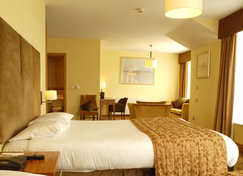 Kettles Country House Hotel in Swords guest room with two beds and seating area