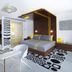 Luna2 Private Hotel in Kuta room with king bed, mustard sofa, and patterned decor