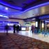 Seven Feathers Casino Resort in Canyonville with casino floor, blue chairs, and lounge seating