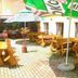 Rezydencja Pod Szczytami in Szklarska Poręba, outdoor patio with wooden tables and umbrellas