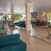 Jolie Ville Hotel & Spa Kings Island Luxor lobby with seating area and floral table centerpiece in Luxor