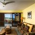 Hana Kai Maui in Hana suite with ocean-view balcony, sliding glass doors, and floral sofa