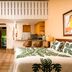 Hana Kai Maui in Hana with a tropical studio suite, king bed, kitchenette and balcony view