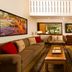 Hana Kai Maui in Hana: bright suite with sofa, coffee table, wood floors and vaulted ceiling