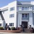 Winthrop Arms Hotel Restaurant Logan Airport in Winthrop, white three-story hotel exterior with columned entrance