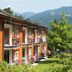 Der Waldhof in Zell am See with balconies, garden greenery, and mountain views
