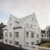 Hotel Hilda in Reykjavik, white multi-story building with steep roof and small balcony