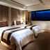 Sun Moon Lake Hotel in Yuchi Township guest room with two beds and large lake view window