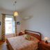 Alkisti City Hotel in Larnaca, guest room with double bed, window, desk and wall-mounted TV