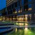 Golden Lake Hotel in Jinhu Township with illuminated outdoor pool and modern glass facade at dusk