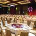 Golden Lake Hotel in Jinhu Township banquet hall with round tables and purple-lit ceiling