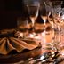 Hotel Zum Ritter in Tannheim table set with ornate glasses, folded napkin, and silverware