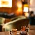 Hotel Zum Ritter in Tannheim table setting with coffee cup, water glass and warm lounge seating