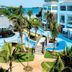 Azul Beach Resort Negril, Gourmet By Karisma in Negril with oceanfront pool, palm trees and thatched bar