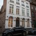 B&B De Bornedrager in Bruges, white townhouse hotel exterior on a narrow street