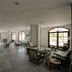 Theodorou Beach Hotel Apartments in Kos, spacious lounge with seating and large arched windows