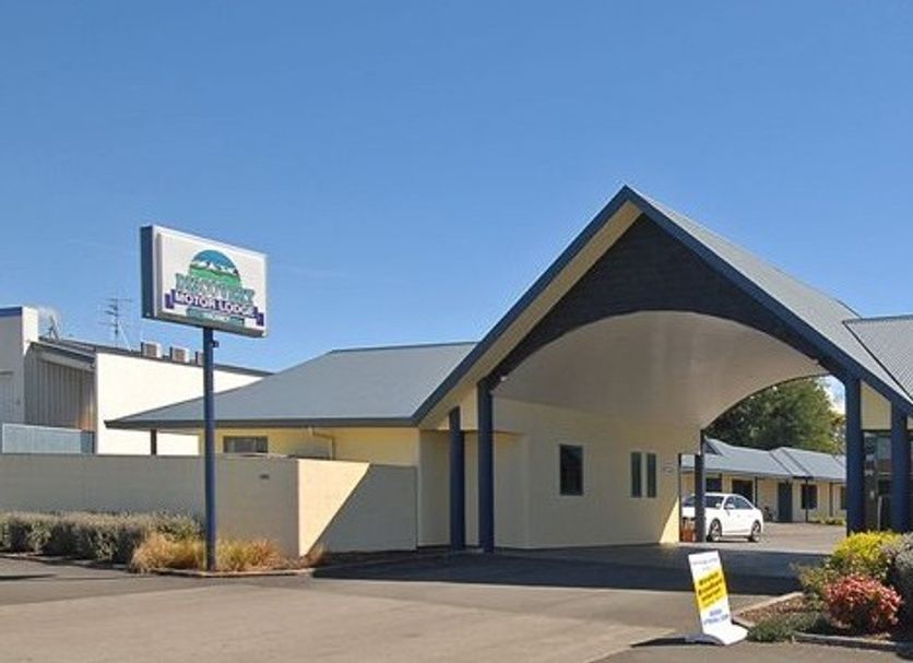 Discovery Motor Lodge in Masterton with a covered driveway entrance and motel sign