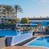 Iberostar Waves Gaviotas Park in Jandía with outdoor pool, cabanas and palm-lined terrace