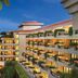 Taj Surajkund Resort & Spa, Delhi Ncr in Faridabad with hillside view and illuminated balconies at dusk