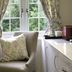 The Anchor Inn in Bristol room with window seat, floral curtains, and a kettle on a countertop.