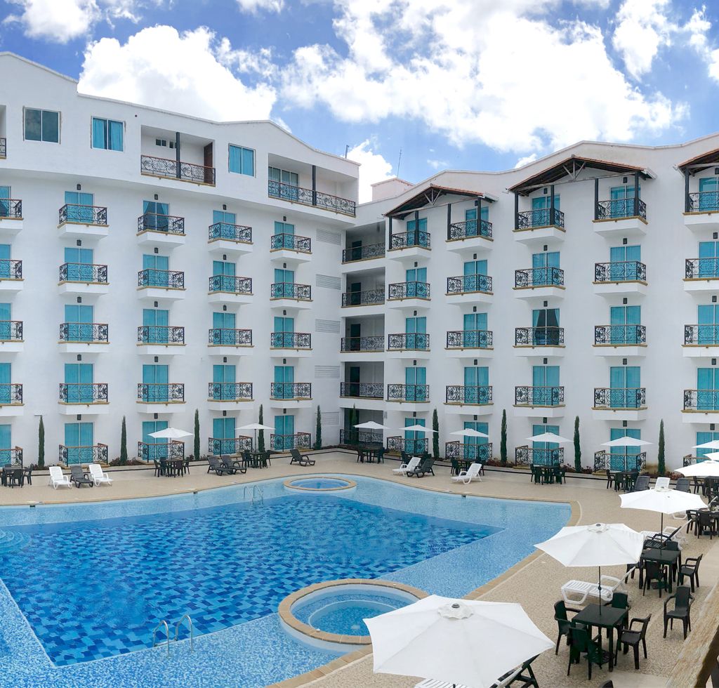 Hotel Majam's Resort in San Gil with a large outdoor pool and multi-story balconies