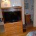 Grand View Motel in Wilmington guest room with TV cabinet, desk chair and adjacent bathroom