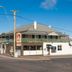 Campbell Town Hotel Motel in Campbell Town on a street corner under a clear blue sky