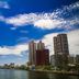 Ambassador Hotel Kaohsiung in Kaohsiung City with riverfront skyline and blue sky