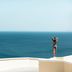 Mitsis Family Village Beach Hotel in Kardamena with sea view and a person on a terrace